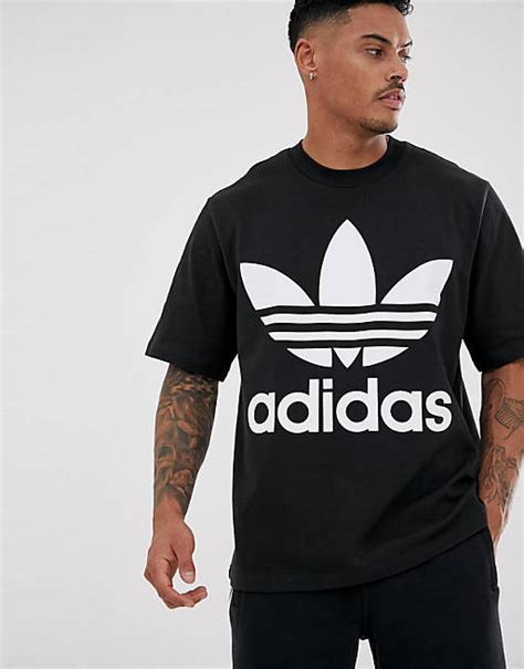 adidas originals t-shirt schwarz mit kleeblatt|adidas Originals – Adilenium – Oversize.